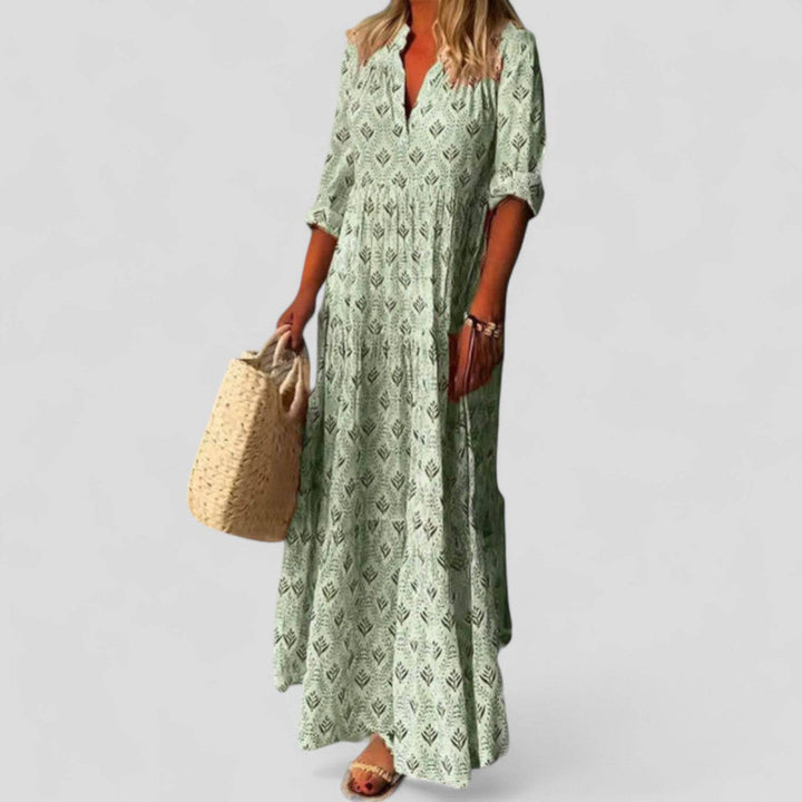 Elegant Marcivine™ maxi dress by Emma & Rose Cape Town featuring a flowing silhouette and sophisticated design.