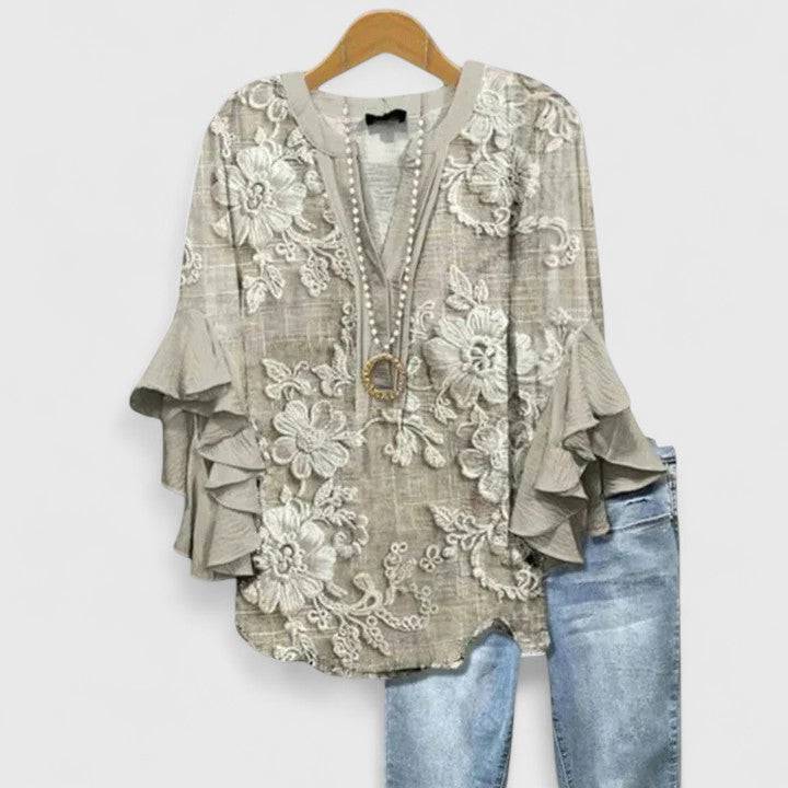Saryphiah™ comfortable blouse by Emma & Rose Cape Town, featuring lightweight fabric and relaxed fit, displayed on a hanger.