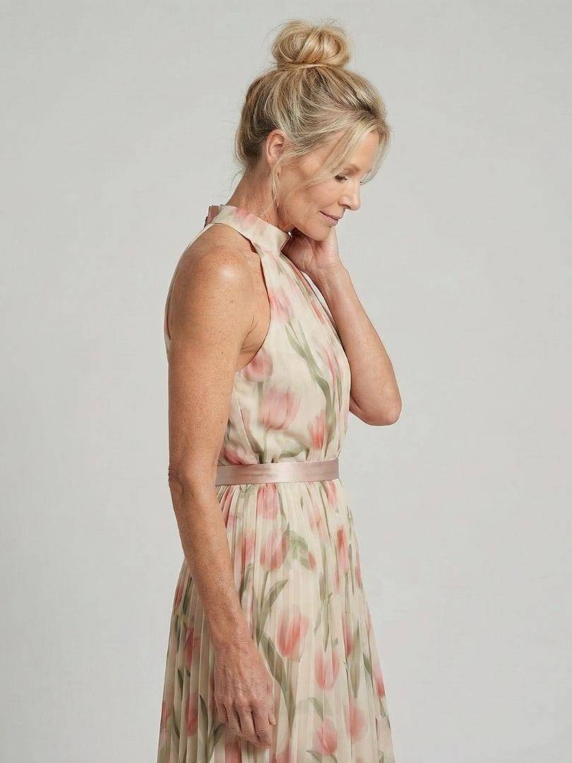 Aurelle™ neck floral midi dress by Emma & Rose Cape Town, showcasing a halter neckline and vibrant floral print.