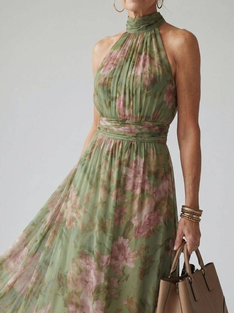 Emma & Rose Cape Town Mirelle™ gathered halter midi dress in soft fabric, shown on a model with a fitted bodice and flowing skirt.