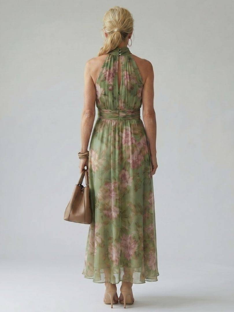 Emma & Rose Cape Town Mirelle gathered halter midi dress displayed on a model with a flowing, elegant silhouette and neutral background.