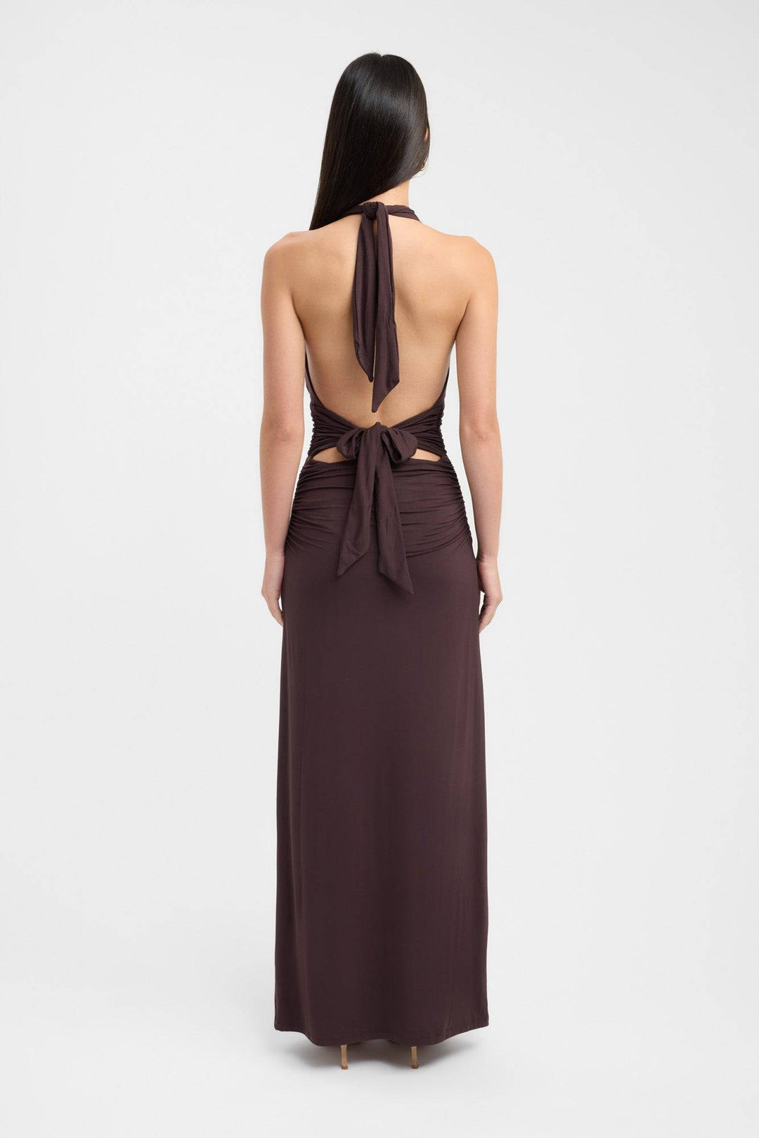 Dark mahogany Serenya™ elegant maxi dress by Emma & Rose Cape Town displayed on a mannequin.