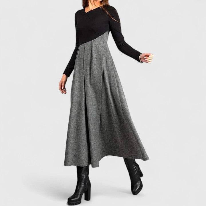 Elegant winter dress by Emma & Rose Cape Town, featuring a stylish fit and sophisticated design perfect for cold weather.