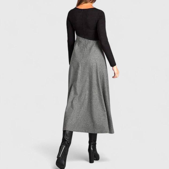 Elegant winter dress by Emma & Rose Cape Town, featuring Rachel's stylish design with intricate details and a sophisticated silhouette.