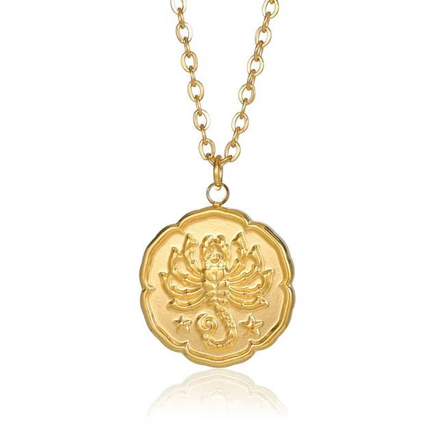 Ned Zodiac Sign Necklace by Emma & Rose Manhattan featuring a round gold-colored constellation disc pendant on a chain.