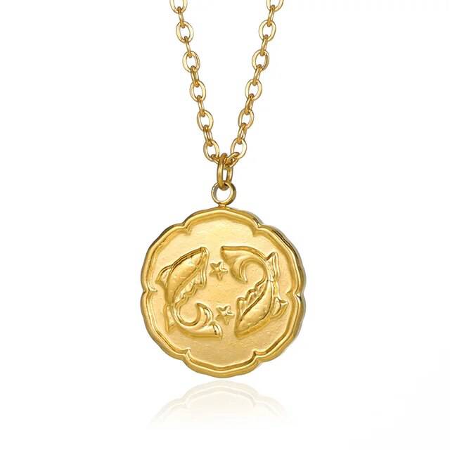 Gold zodiac sign necklace by Emma & Rose Manhattan featuring a round disc pendant with constellation design for women and men.