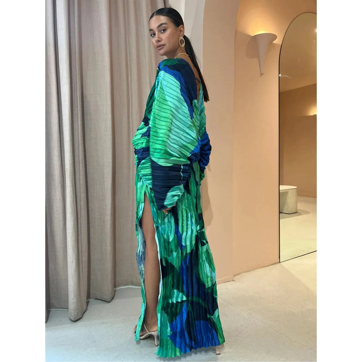 Eva™ Elegant Pleated Dress by Emma & Rose Cape Town, showcasing a stylish, flowing dress with pleats and a sophisticated silhouette.