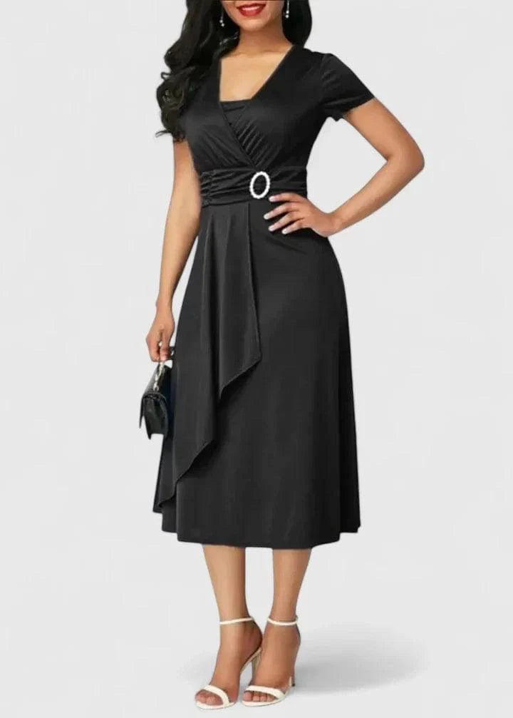Elegant Zhyrelle™ midi dress by Emma & Rose Cape Town, featuring a flowing fabric and sophisticated design, displayed on a model.