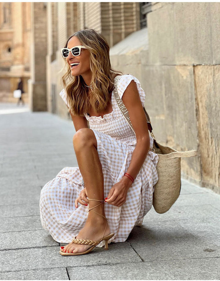 Emma & Rose Cape Town Lyra™ Bohemian casual dress for spring and summer, featuring a flowy, patterned fabric in natural light.