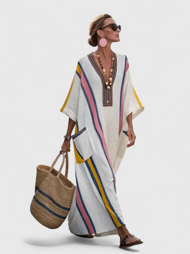 Elegant Kyvanna™ maxi dress by Emma & Rose Cape Town, flowing fabric with a stylish design, perfect for formal occasions