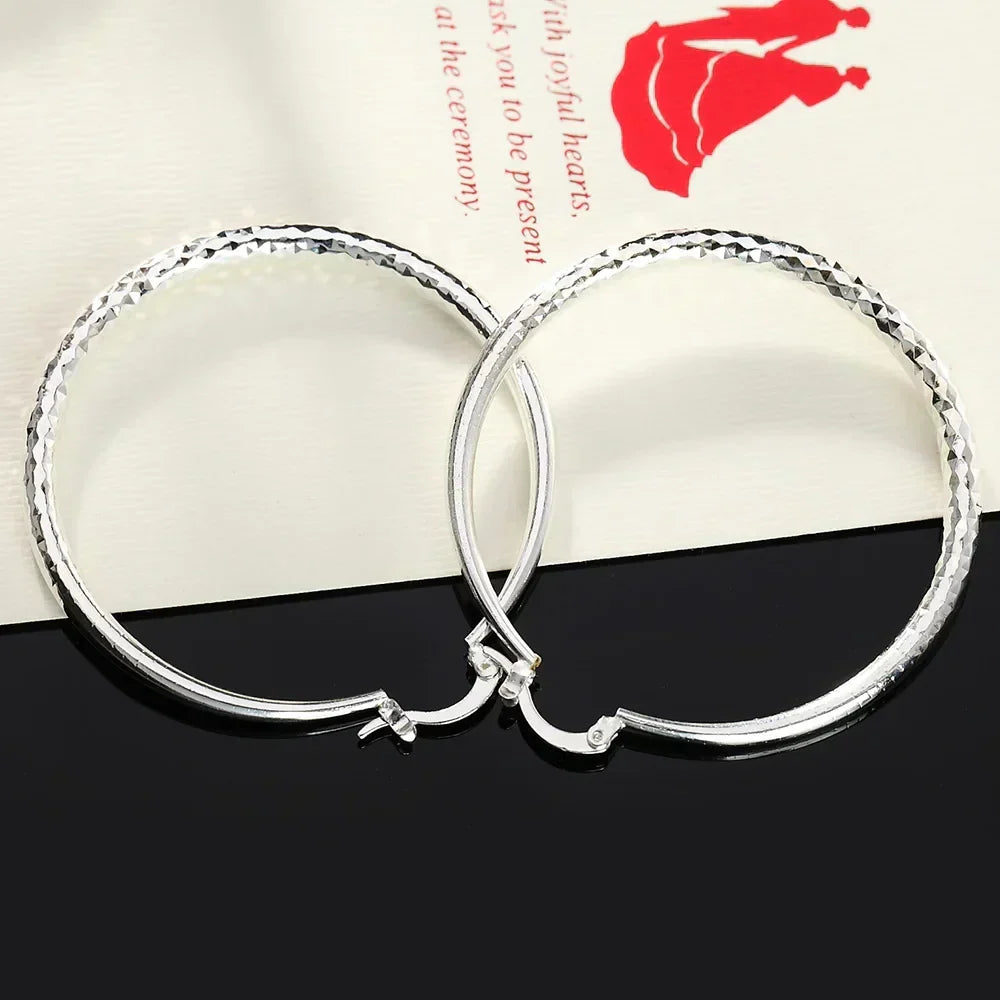 Sterling Silver Hoop Earrings, view 5 - Elena Harper