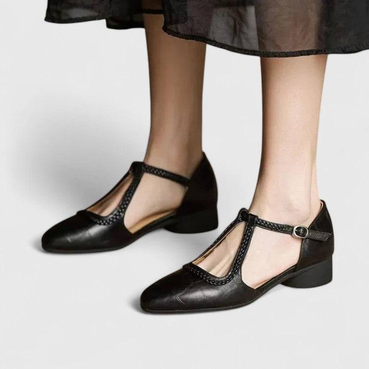 Delphine™ flat sandals by Emma & Rose Cape Town featuring tan leather straps and minimalist design, suitable for casual wear.