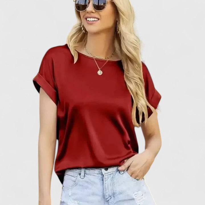 Elegant Emma & Rose Cape Town Lioraine™ blouse featuring a stylish, flowy design with intricate detailing.