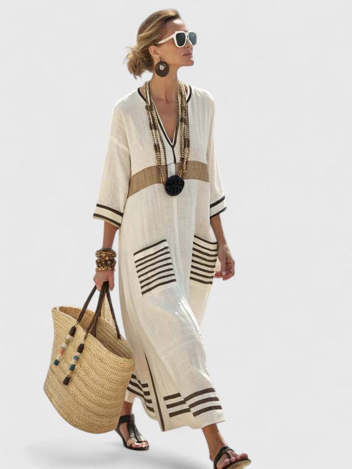 Elegant Kyvanna™ maxi dress by Emma & Rose Cape Town, featuring flowing fabric and a stylish, sophisticated design.