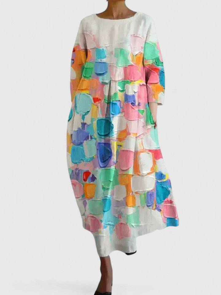 Emma & Rose Cape Town Margaritte™ stylish midi dress, featuring a fitted waist and flowing fabric, displayed on a mannequin.