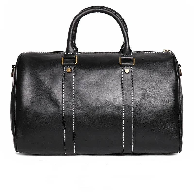 Emma & Rose Manhattan Riley™ Roma Duffle Bag in sleek fabric with sturdy handles and a spacious main compartment.