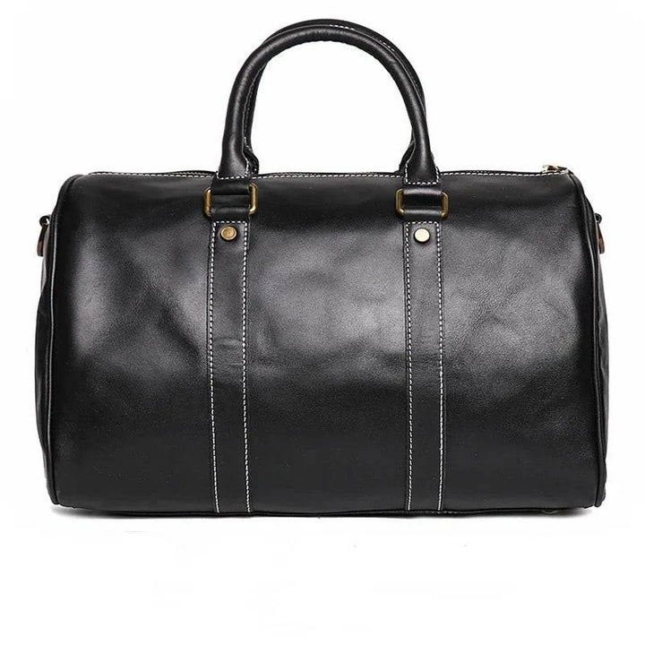 Emma & Rose Manhattan Riley™ Roma Duffle Bag in sleek fabric with sturdy handles and a spacious main compartment.