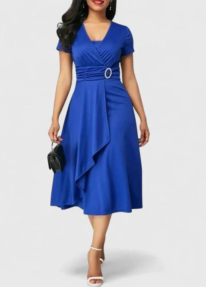 Elegant Zhyrelle™ midi dress by Emma & Rose Cape Town, shown in a stylish and flowing design on a model.