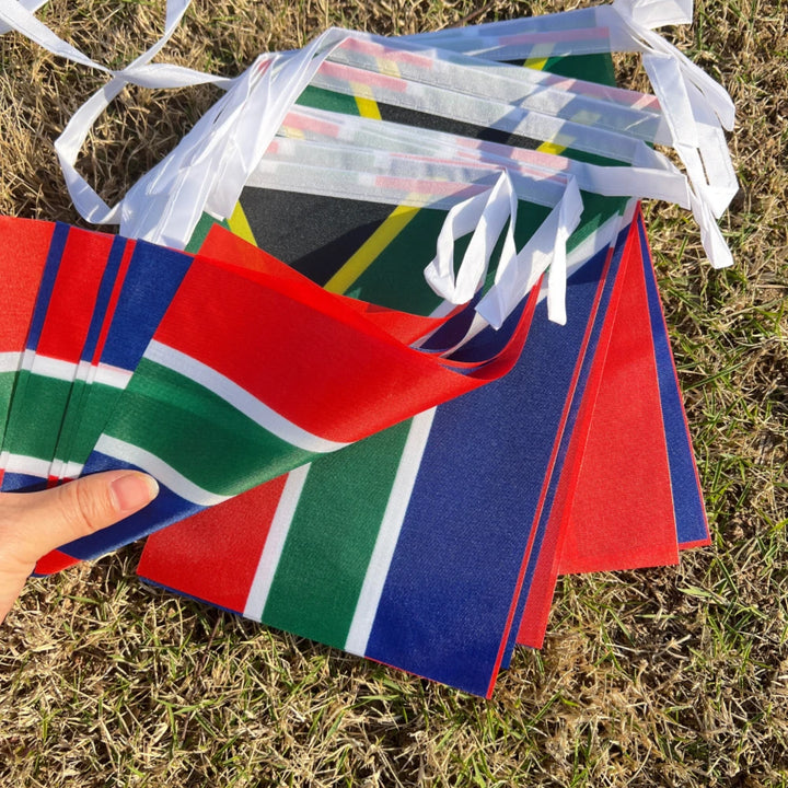South Africa World Cup 2026 decoration flag by Emma & Rose Cape Town featuring vibrant colors and South African flag design.