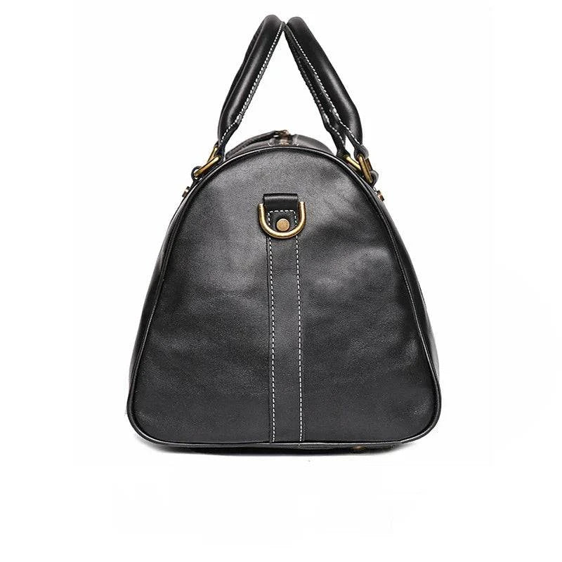 Emma & Rose Manhattan Riley™ Roma Duffle Bag in black with leather handles and spacious interior for travel and daily use.