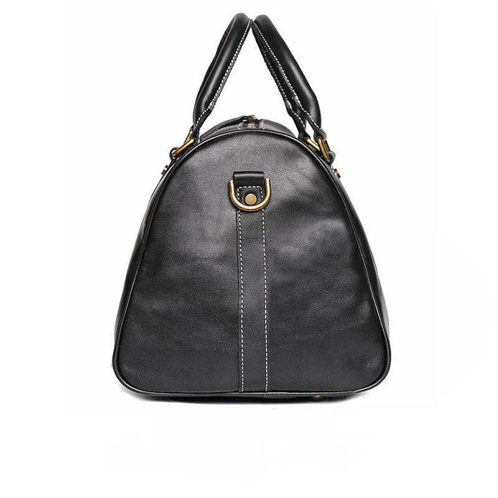 Emma & Rose Manhattan Riley™ Roma Duffle Bag in black with leather handles and spacious interior for travel and daily use.