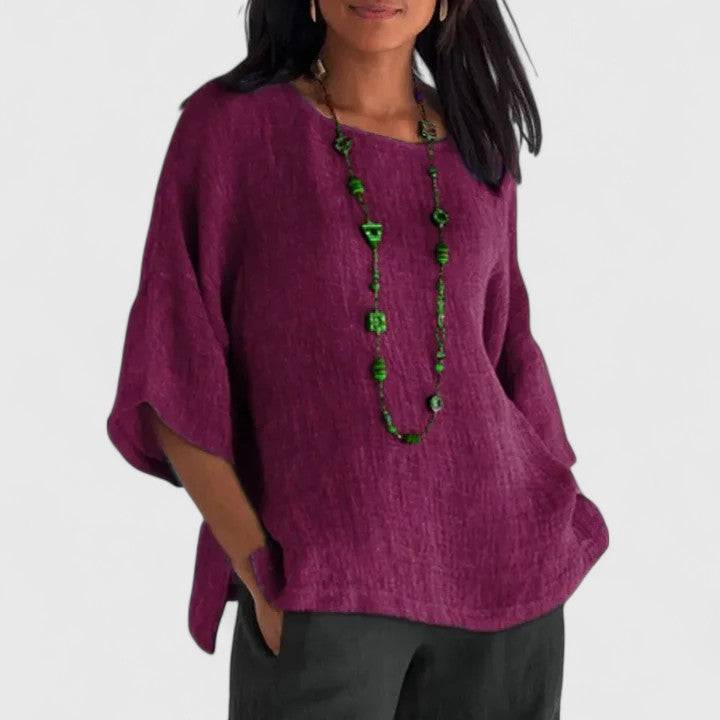 Emma & Rose Cape Town Mireille™ comfortable blouse in soft fabric, shown on a model with a relaxed fit and stylish design.