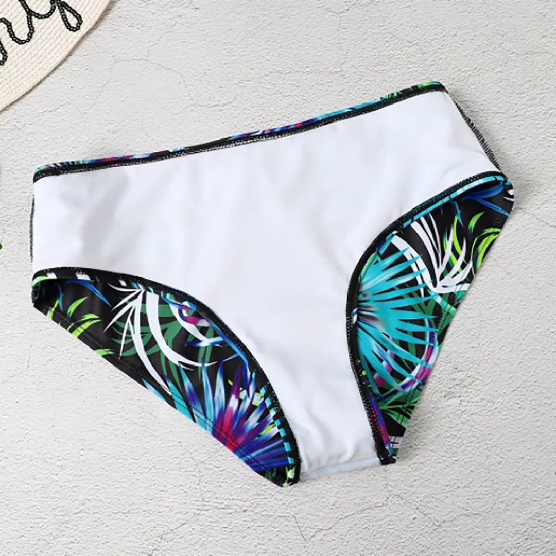 Ana | High-waisted bikini with straps and tropical print
