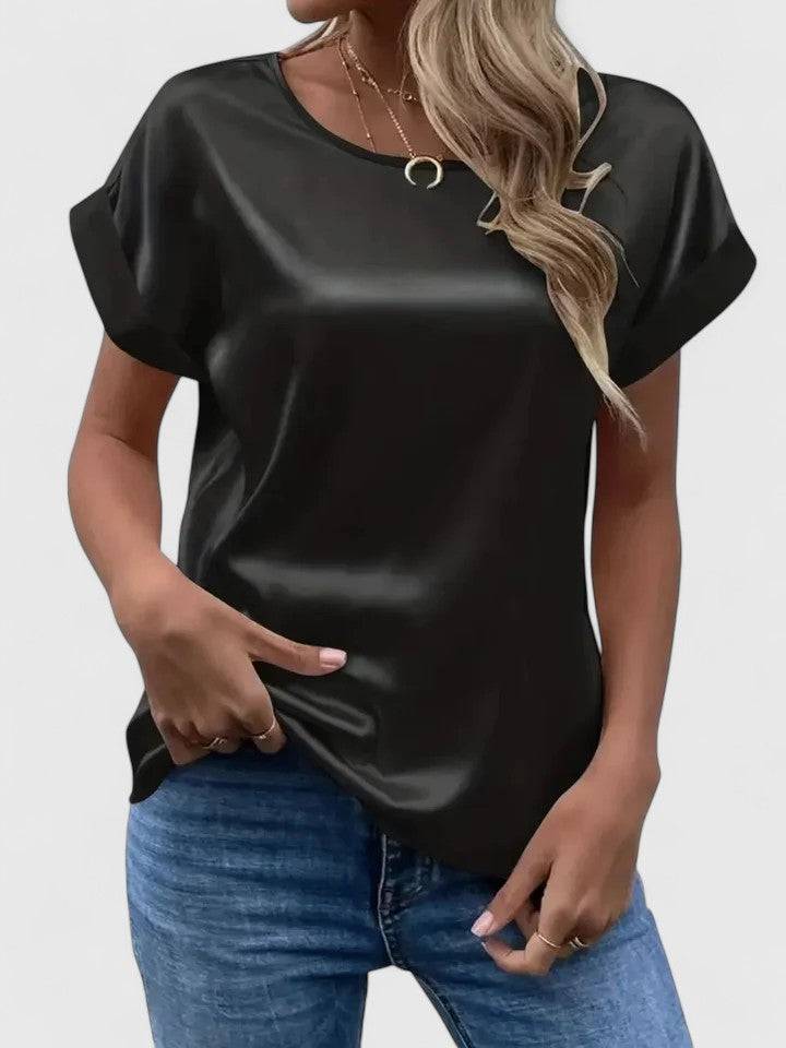Emma & Rose Cape Town Lioraine™ elegant blouse featuring a stylish design and lightweight fabric, shown in a close-up image.