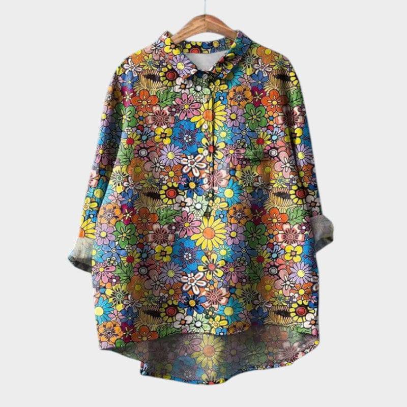 Elegant Sia™ blouse by Emma & Rose Cape Town, featuring a stylish, flowy fabric and classic design, shown on a model.