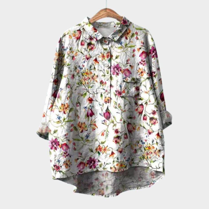 Elegant Sia™ blouse by Emma & Rose Cape Town, shown in a close-up image highlighting the fabric and stylish design.