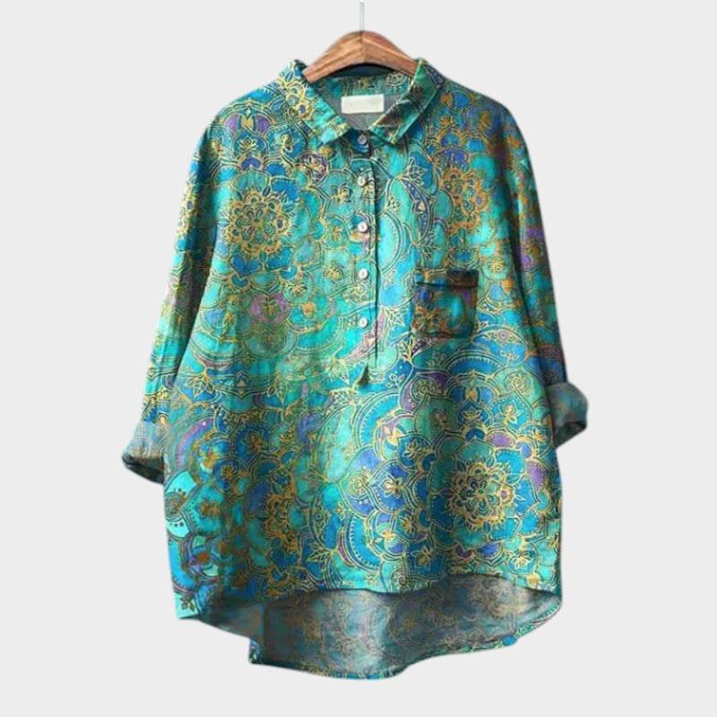 Elegant Sia™ blouse by Emma & Rose Cape Town, featuring a stylish, flowing design and intricate detailing in soft fabric.