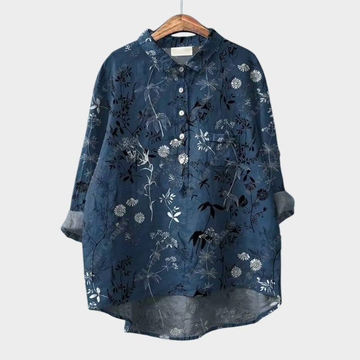 Elegant Sia™ blouse by Emma & Rose Cape Town, featuring a stylish, flowing design with detailed neckline and soft fabric.