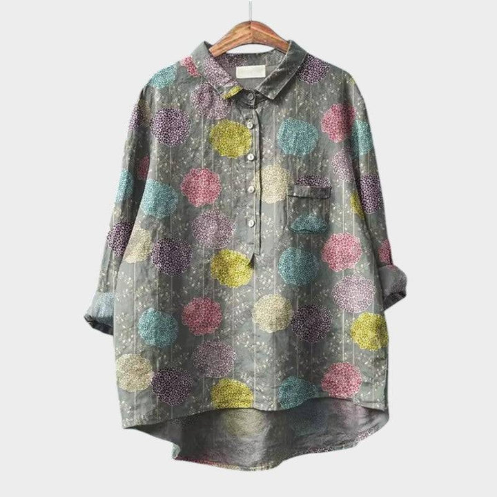 Elegant Sia™ blouse by Emma & Rose Cape Town, featuring a stylish, lightweight fabric with a classic collar and button details.