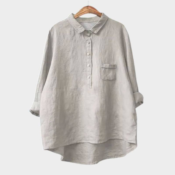 Naja™ elegant blouse by Emma & Rose Cape Town featuring a stylish, fitted design with intricate detailing and soft fabric.