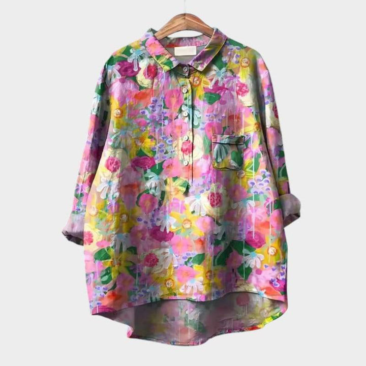 Ronja™ elegant blouse by Emma & Rose Cape Town, shown in a light-colored, stylish fabric with a relaxed fit and detailed collar.