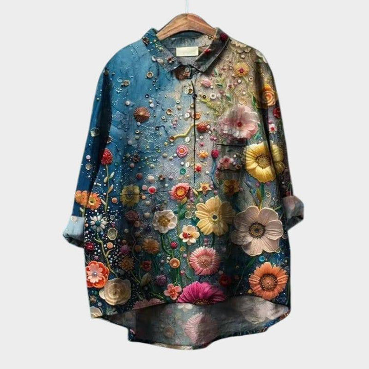 Ronja™ elegant blouse by Emma & Rose Cape Town, featuring a chic, flowy design with long sleeves and a stylish collar.