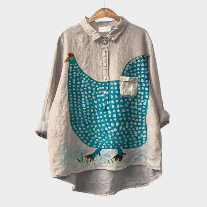 Elegant Saga™ blouse by Emma & Rose Cape Town, featuring a stylish, flowy design with intricate details and a sophisticated fit.