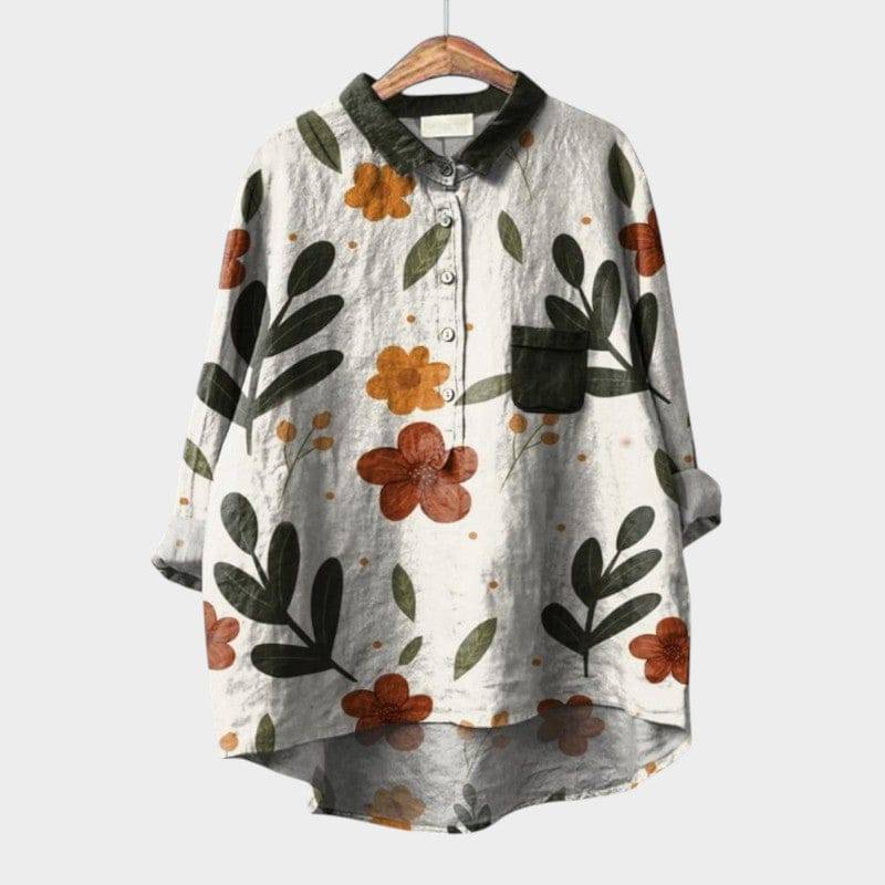 Elegant Emma & Rose Cape Town Nola™ blouse with a stylish, flowing design and intricate detailing, perfect for sophisticated wear.