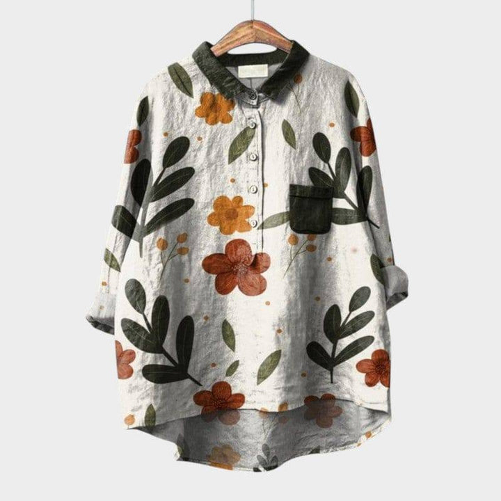 Elegant Emma & Rose Cape Town Nola™ blouse with a stylish, flowing design and intricate detailing, perfect for sophisticated wear.