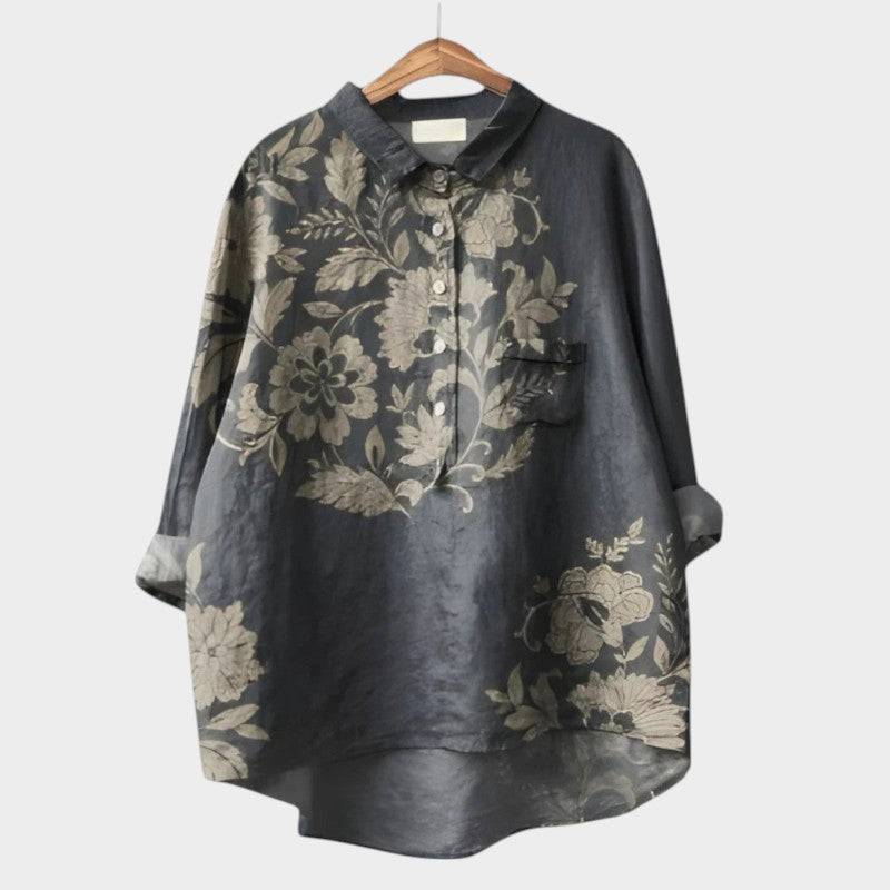 Elegant Nola™ blouse by Emma & Rose Cape Town, shown in a stylish, flowing design with a soft fabric and classic collar.