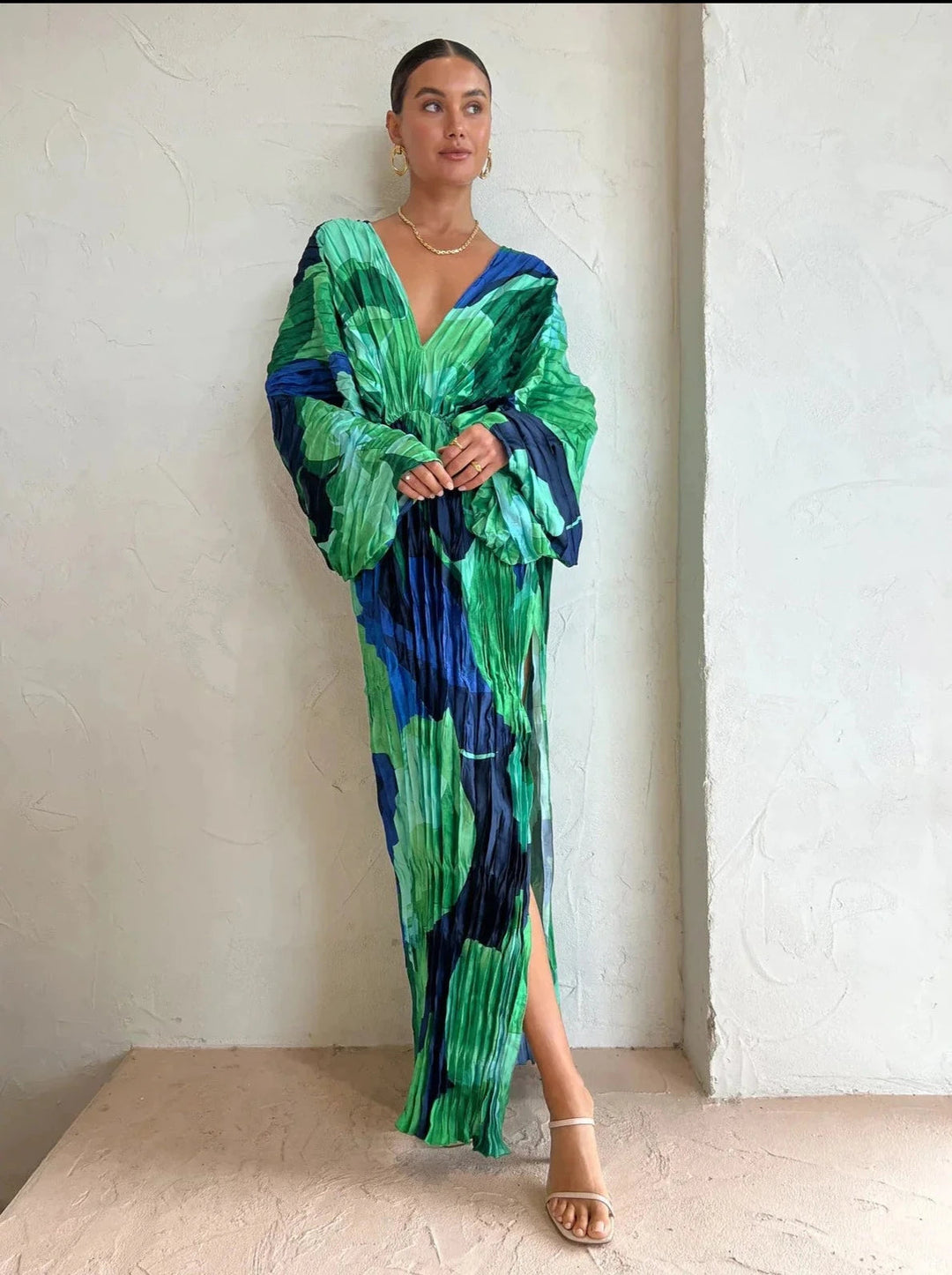 Emma & Rose Cape Town Eva™ Elegant Pleated Dress, front view showcasing the flowy fabric and pleated design.
