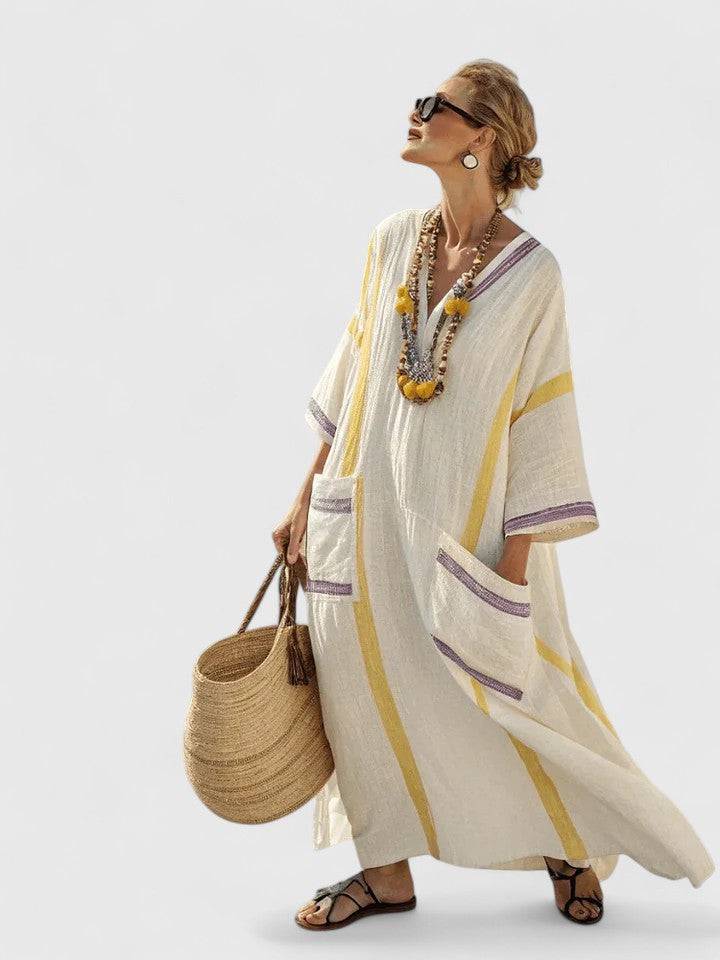 Kyvanna™ elegant maxi dress by Emma & Rose Cape Town, flowing fabric and stylish design perfect for formal occasions.