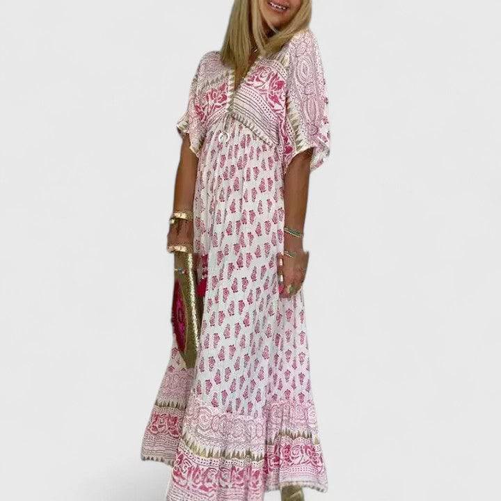 Lyrianna™ comfortable maxi dress by Emma & Rose Cape Town, flowing fabric and elegant design visible in the image.