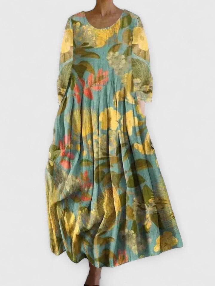 Emma & Rose Cape Town Margaritte™ stylish midi dress displayed on a mannequin with a flowing fabric design.