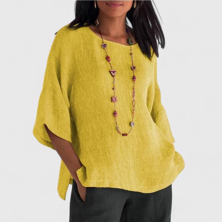 Mireille™ comfortable blouse by Emma & Rose Cape Town, shown in soft fabric with a relaxed fit and elegant design.