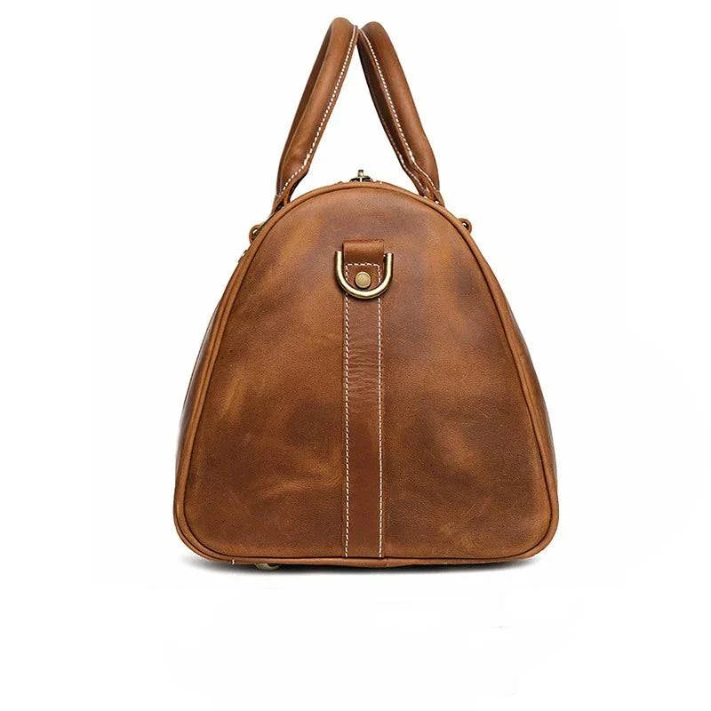 Emma & Rose Manhattan Riley™ Roma Duffle Bag in tan leather with handles and zipper closure, stylish travel and gym bag.