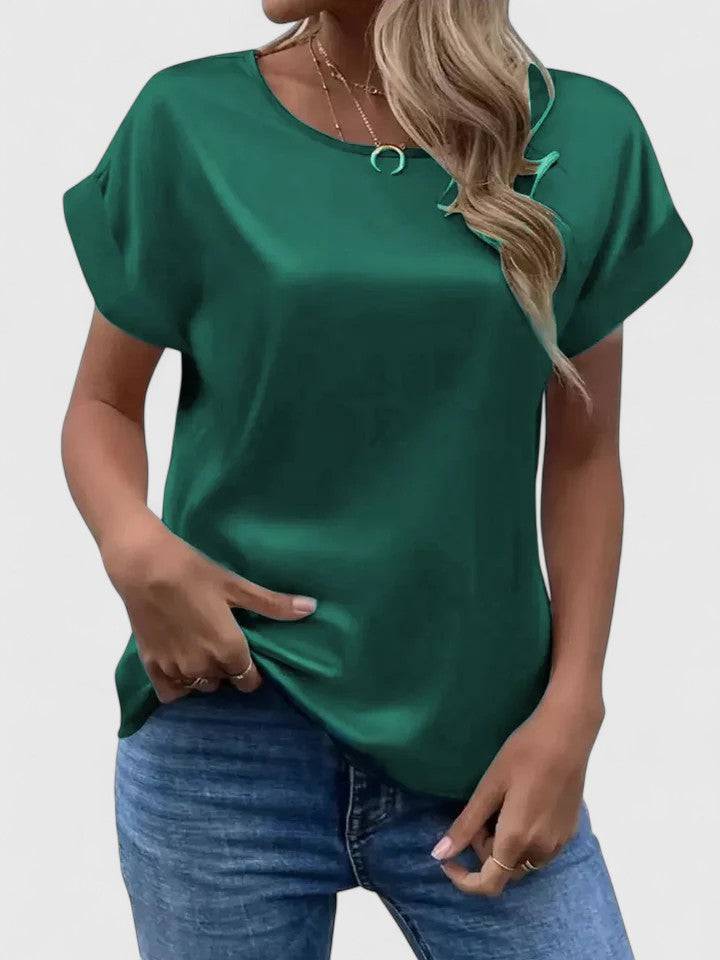 Elegant Emma & Rose Cape Town Lioraine™ blouse with floral details, lightweight fabric, and tailored fit.
