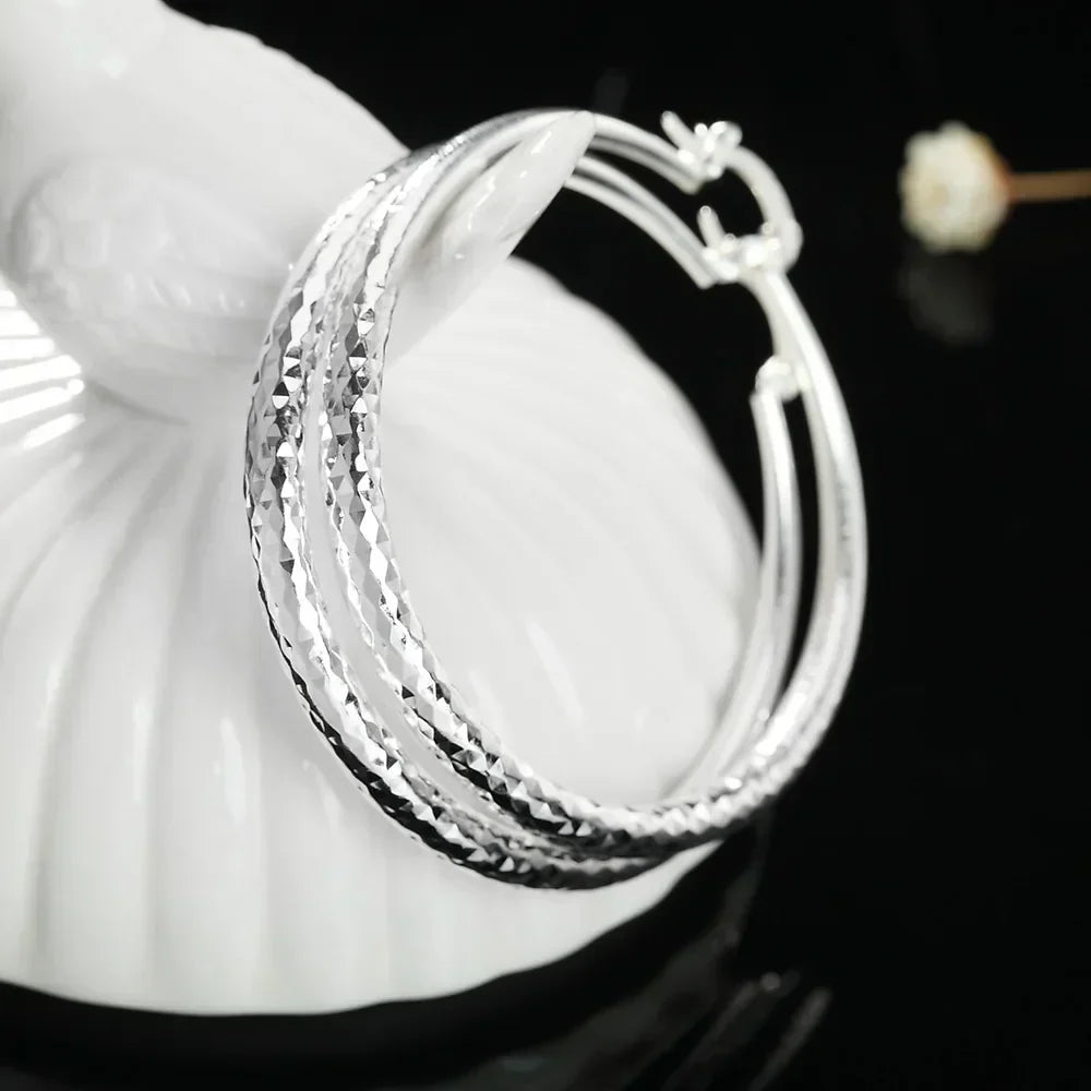 Sterling Silver Hoop Earrings, view 4 - Elena Harper