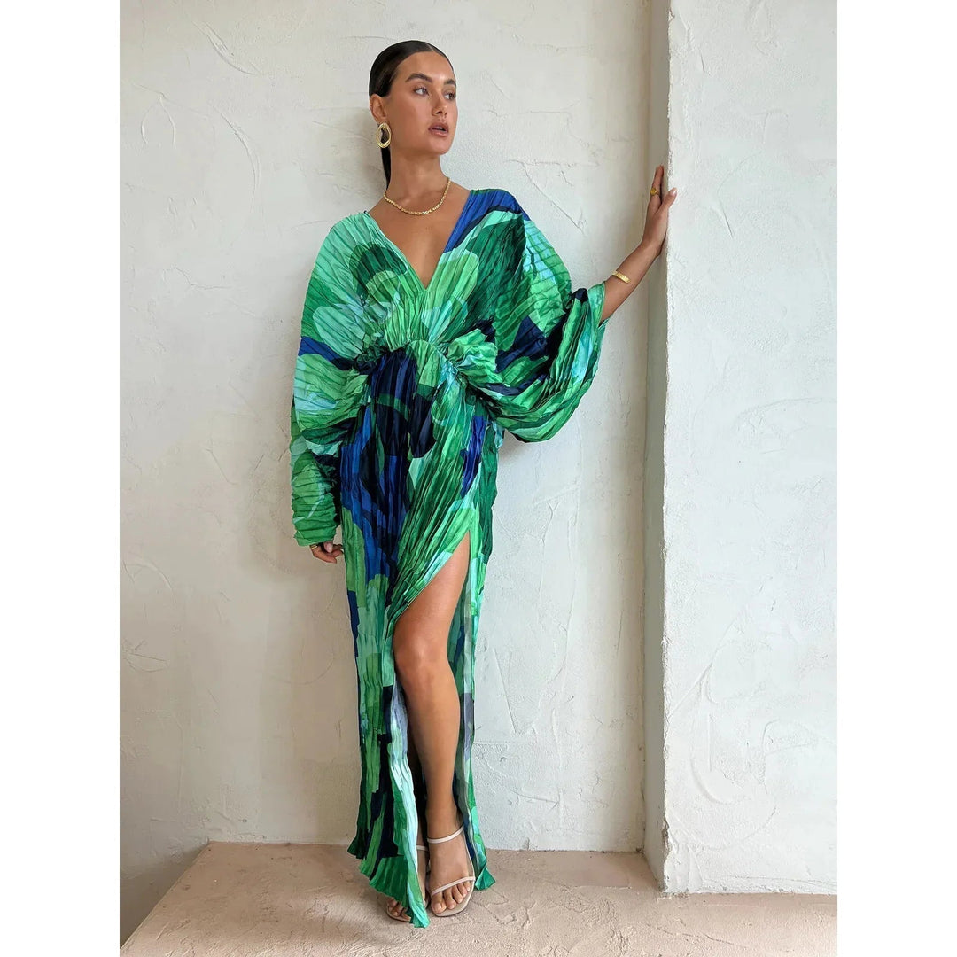 Eva™ Elegant Pleated Dress by Emma & Rose Cape Town, shown in a flowing, pleated fabric with a flattering silhouette.