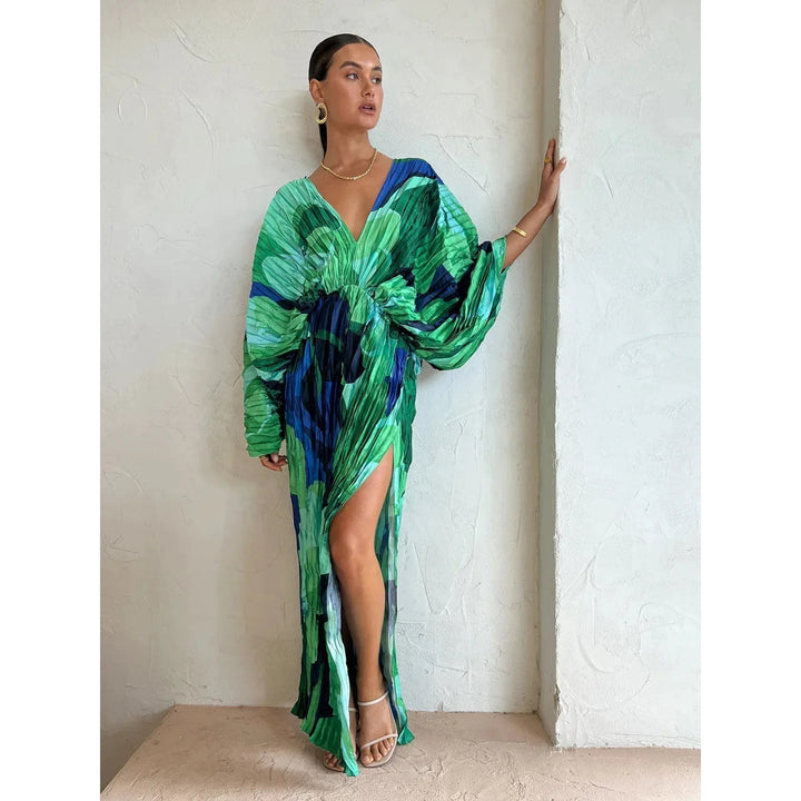 Eva™ Elegant Pleated Dress by Emma & Rose Cape Town, shown in a flowing, pleated fabric with a flattering silhouette.